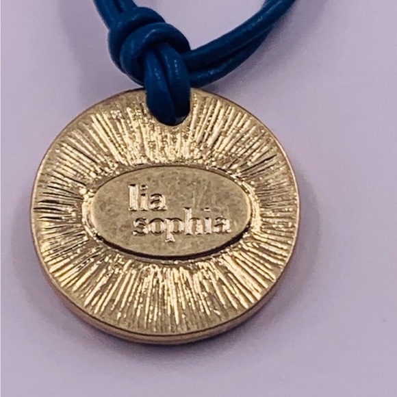 Lia Sophia Spotlight Crystal
Pave Coin Gold Tone Pendant Blue
Cord Necklace - Picture 6 of 6